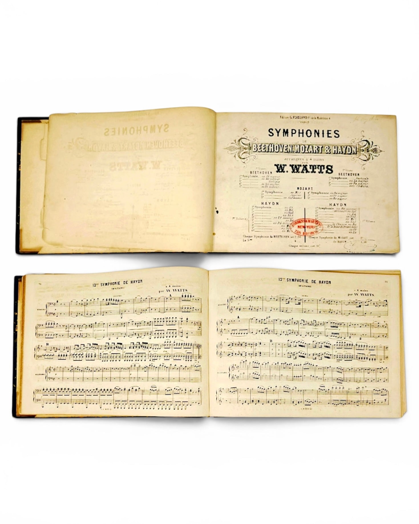 An antique book or album showing four open pages with printed sheet music and title pages, including 'Symphonies' and 'N. Watts,' photographed against a plain white background.