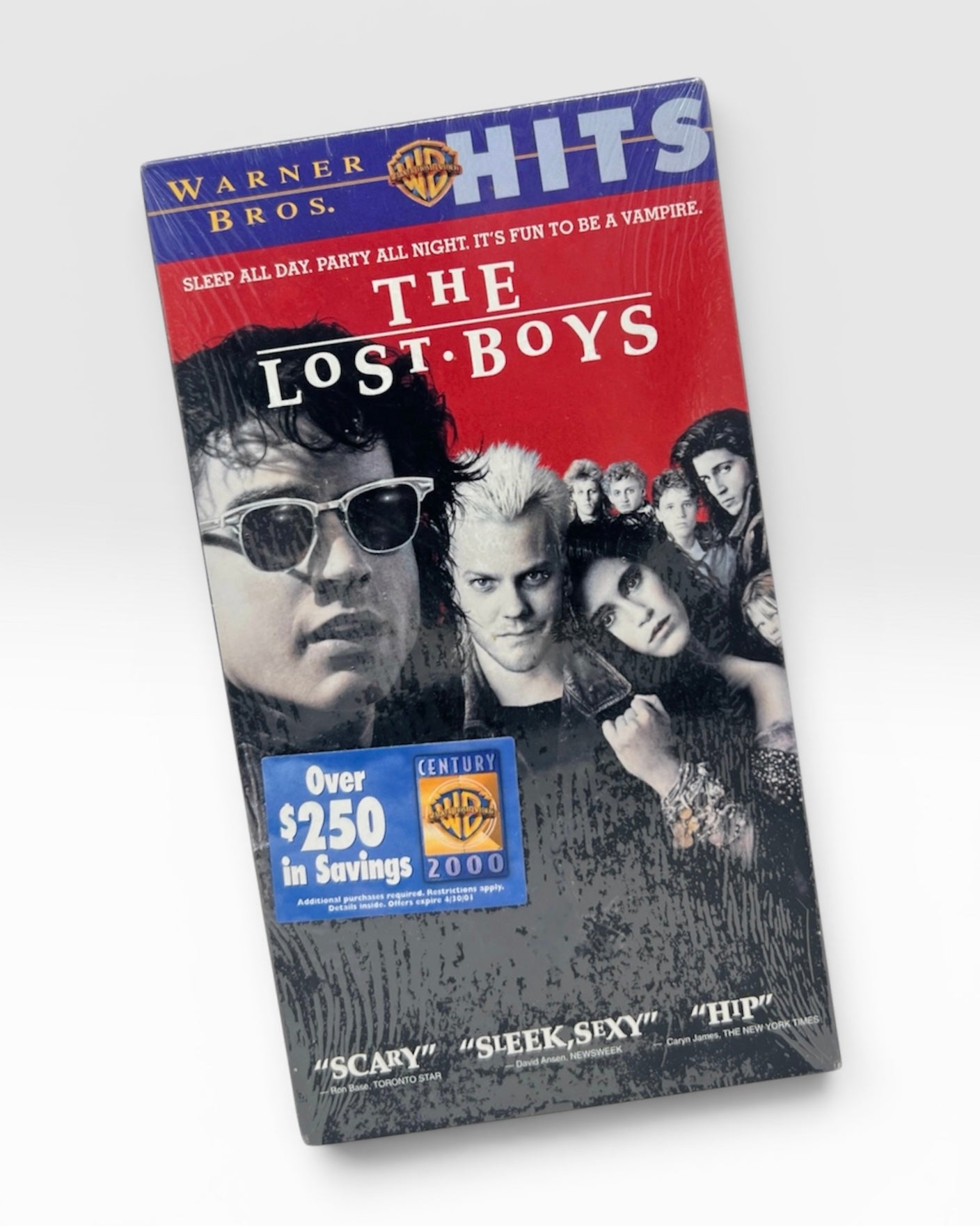 VHS cover for Warner Bros. Hits The Lost Boys, shown at an angle on a light gray background.