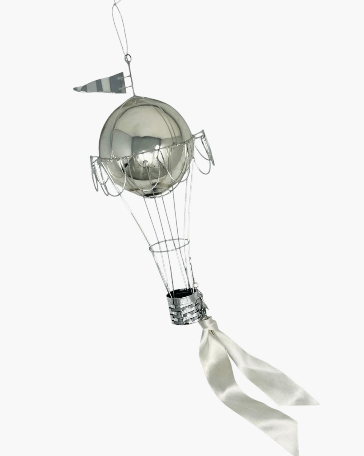 Silver decorative element with a ribbon on a white background