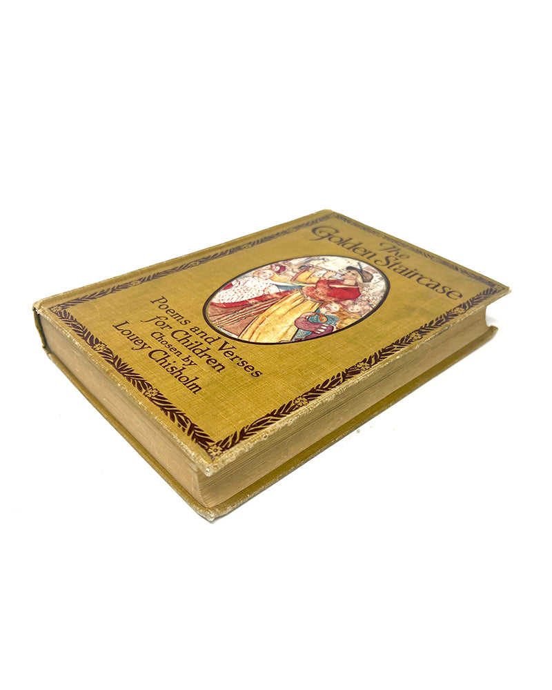 Antique book titled 'The Golden Staircase, Poems and Verses for Children' (1907) with decorative cover on a white background