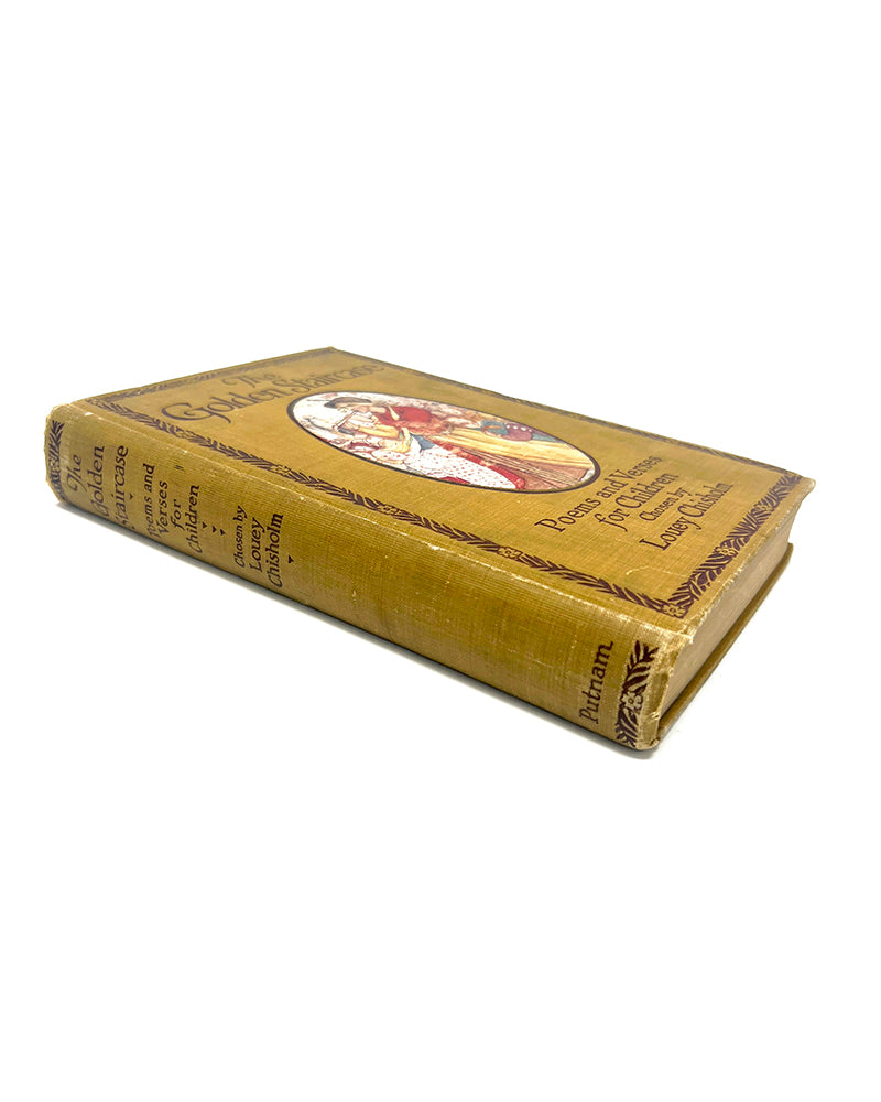Antique book titled 'The Golden Staircase, Poems and Verses for Children' (1907) with decorative cover on a white background